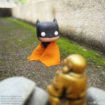 batman and laughing buddha